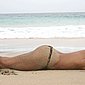 Sch�ne Frau nackt am Strand