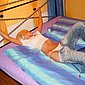 Geile Blonde in heissen Posen auf dem Bett